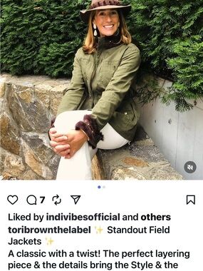Tori Brown green army jacket with fur collar at the sleeves
